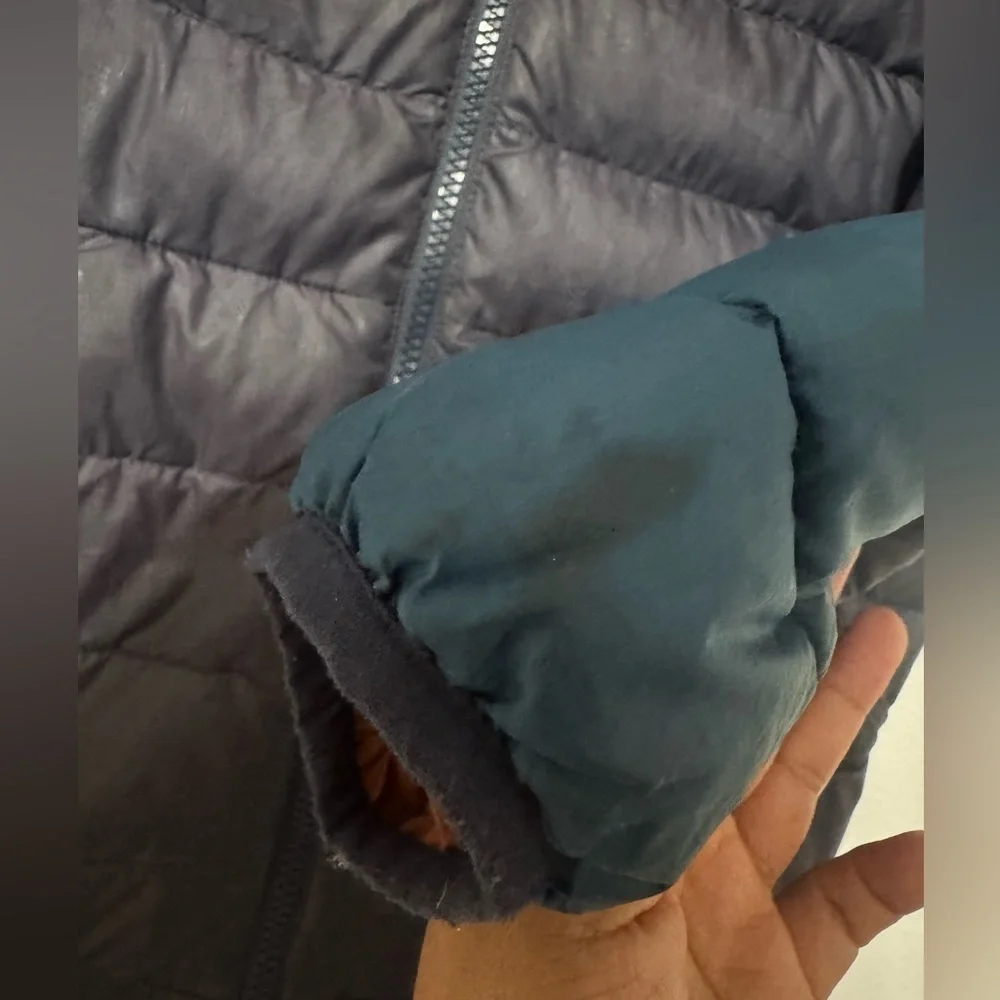 Patagonia Blue and Brown Puffer Jacket with Geometric Design